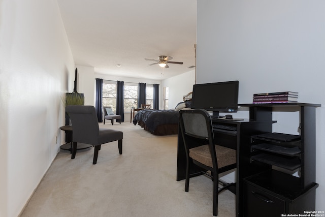 bedroom featuring ceiling fan and light colored carpet