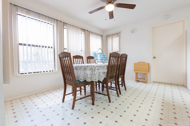 dining space featuring ceiling fan