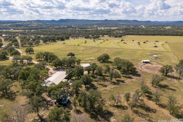 birds eye view of property with a rural view and a mountain view