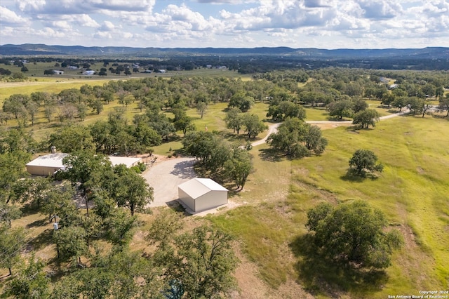 bird's eye view with a mountain view and a rural view