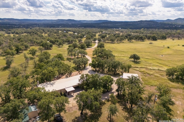 birds eye view of property featuring a rural view and a mountain view