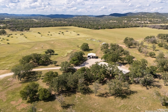 bird's eye view featuring a rural view and a mountain view