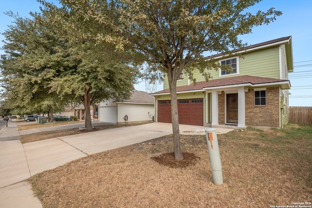 view of front of home with a garage