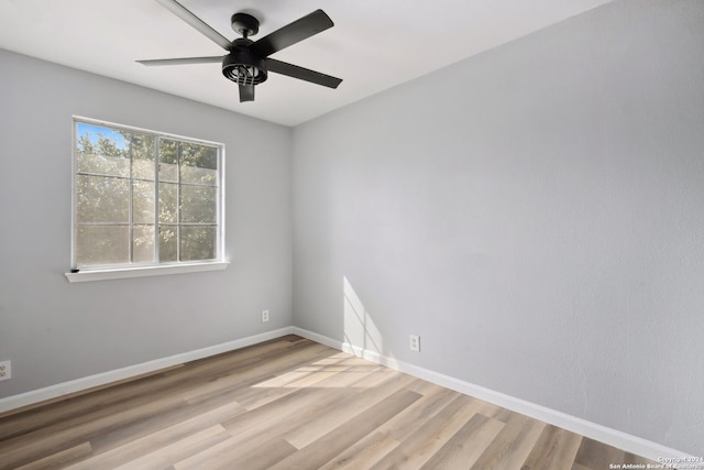 unfurnished room featuring light hardwood / wood-style floors and ceiling fan