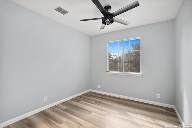 unfurnished room featuring ceiling fan and light hardwood / wood-style flooring