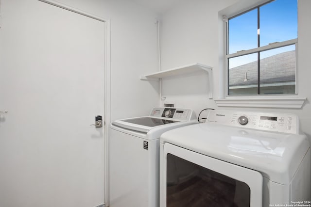 laundry area with washer and dryer