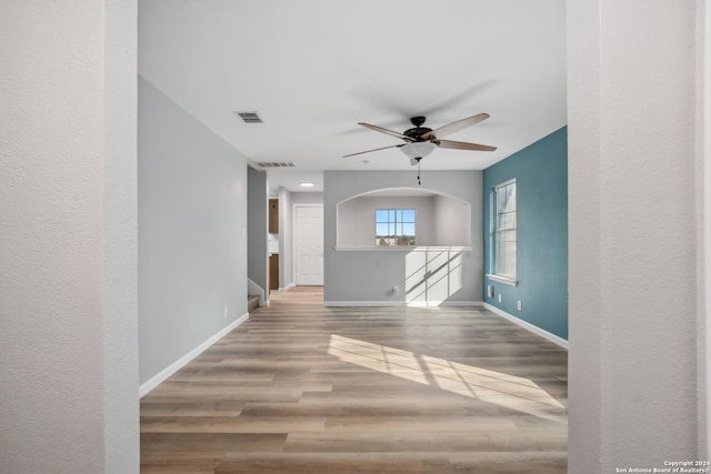 interior space featuring ceiling fan and hardwood / wood-style floors