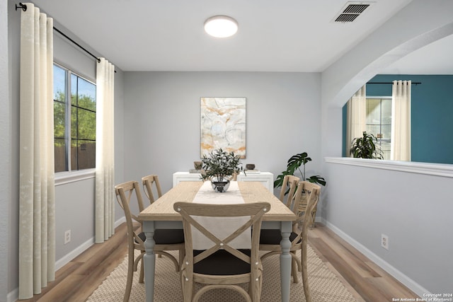 dining room featuring light hardwood / wood-style flooring