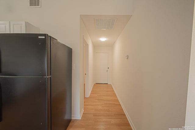 hall featuring light wood-type flooring