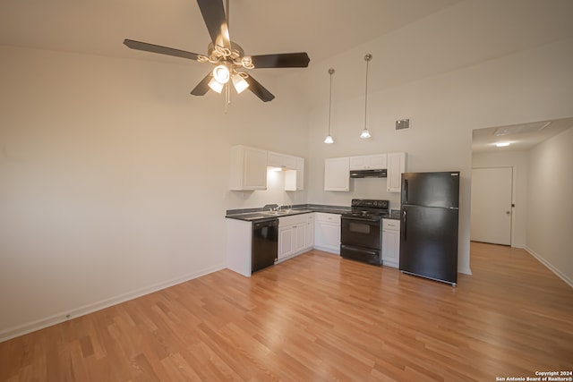 kitchen featuring ceiling fan, white cabinets, high vaulted ceiling, black appliances, and light hardwood / wood-style floors