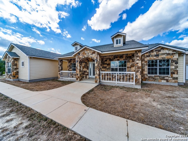 view of front of house featuring covered porch