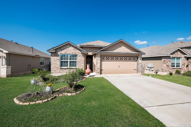 single story home with a garage and a front lawn