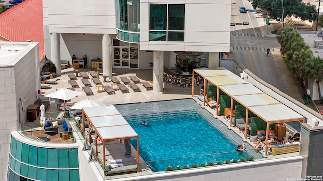 view of pool featuring a patio area