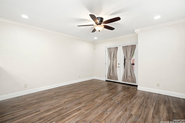 unfurnished room featuring ceiling fan, ornamental molding, and dark wood-type flooring