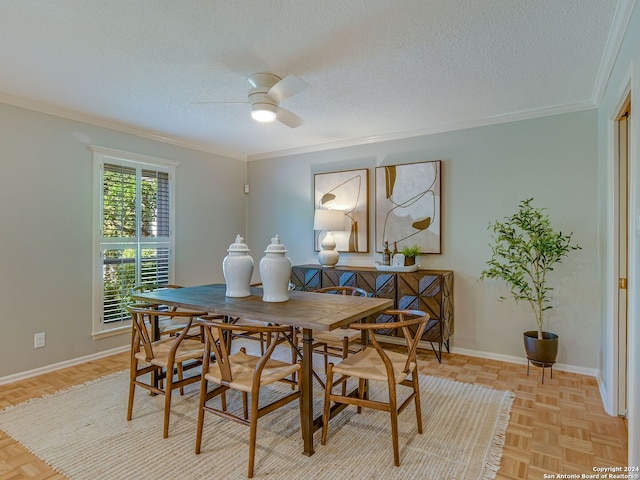 dining space with crown molding, light parquet flooring, and a textured ceiling