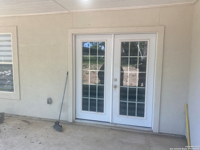 view of exterior entry with french doors