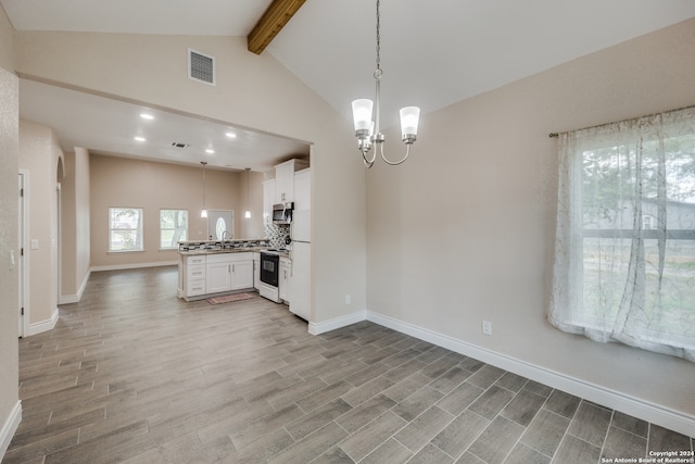 kitchen with light wood-type flooring, sink, white cabinets, hanging light fixtures, and vaulted ceiling with beams