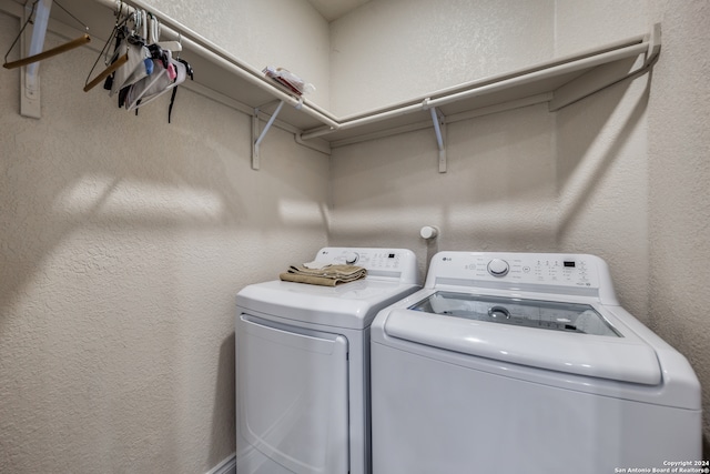 laundry room featuring washer and dryer