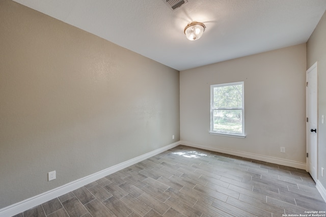 empty room featuring light wood-type flooring