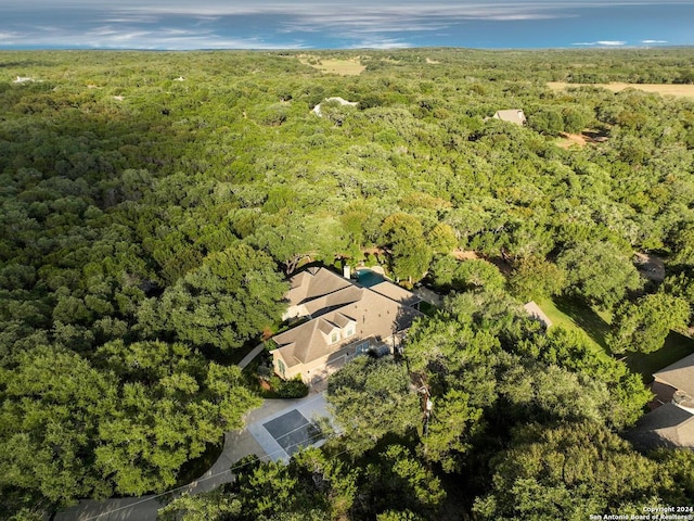 drone / aerial view with a view of trees