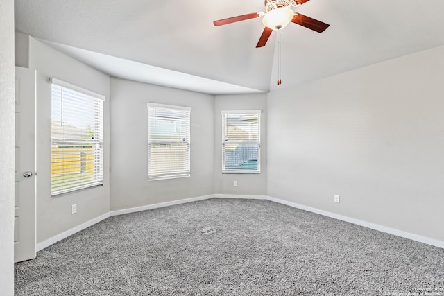 unfurnished room with carpet, ceiling fan, and lofted ceiling