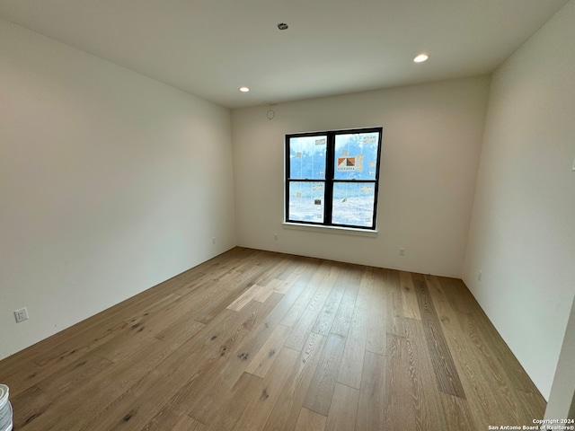 empty room featuring light hardwood / wood-style floors