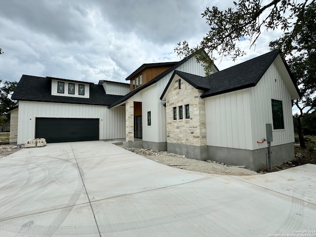 modern farmhouse with a garage