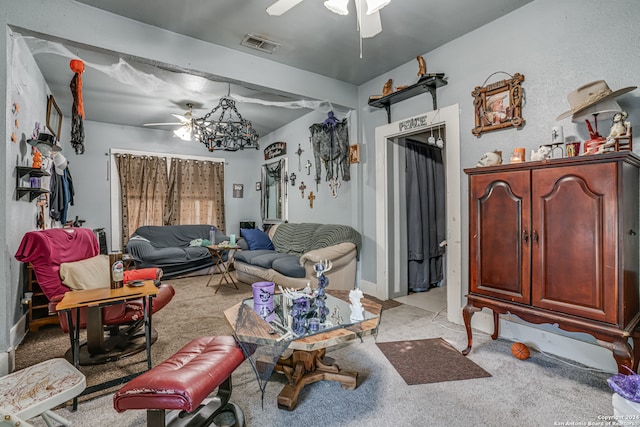 living room featuring ceiling fan and light colored carpet