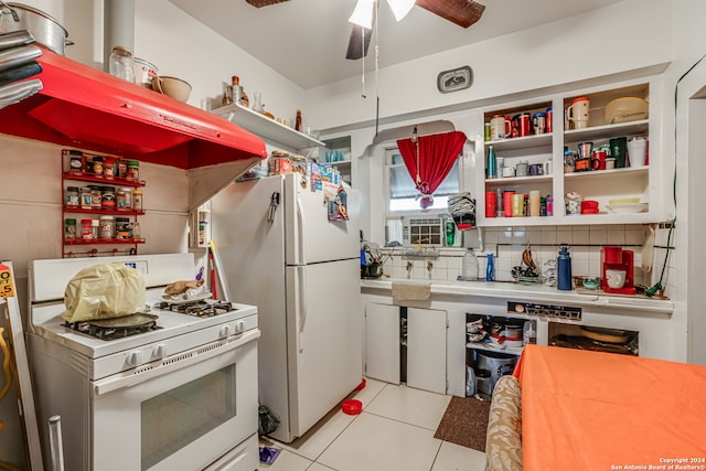 kitchen with decorative backsplash, white cabinets, white appliances, light tile patterned floors, and ceiling fan