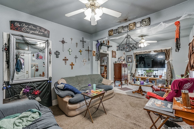 carpeted living room featuring ceiling fan