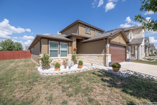 view of front facade featuring concrete driveway, stucco siding, fence, an attached garage, and stone siding