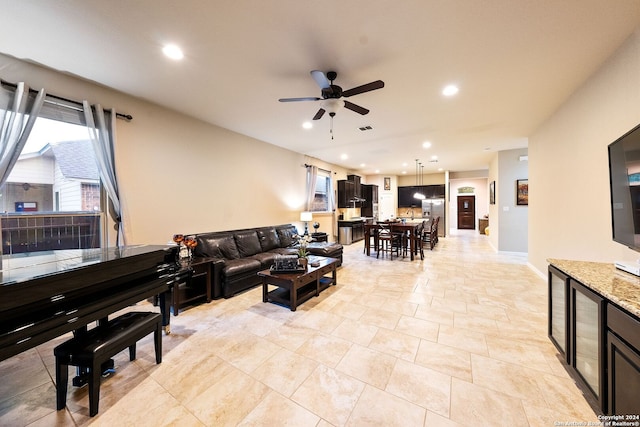 living room featuring ceiling fan