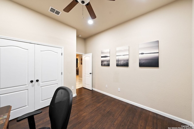 office with dark wood-type flooring and ceiling fan