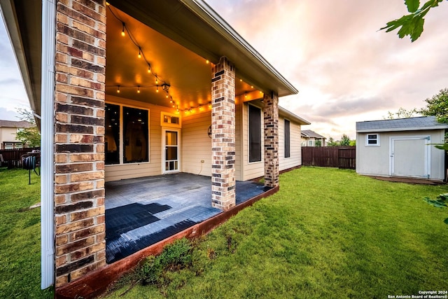 exterior space with a yard and a patio