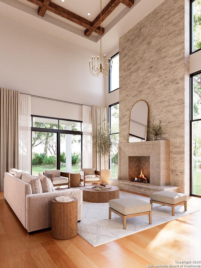 living area featuring a towering ceiling, an inviting chandelier, coffered ceiling, wood finished floors, and beamed ceiling
