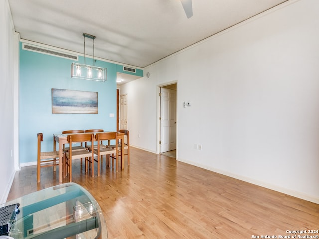 dining area with hardwood / wood-style floors