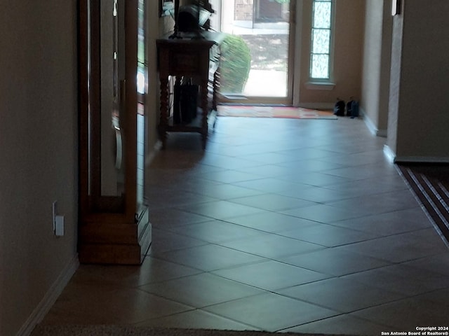 hall featuring tile patterned floors