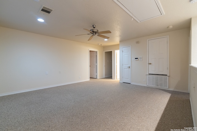 empty room with carpet floors and ceiling fan