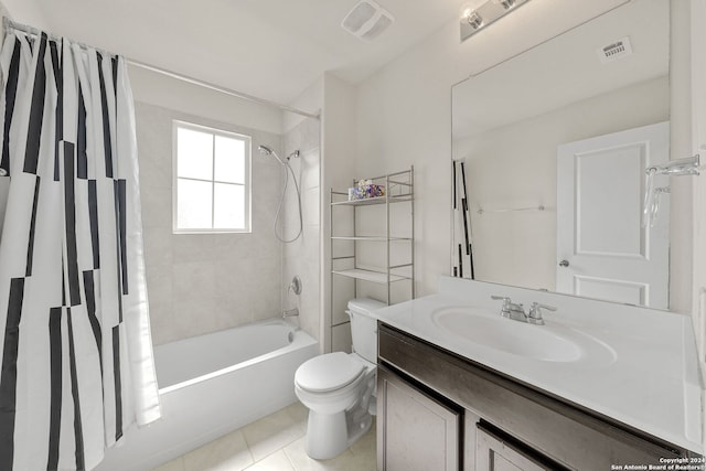 full bathroom featuring shower / tub combo, tile patterned flooring, vanity, and toilet