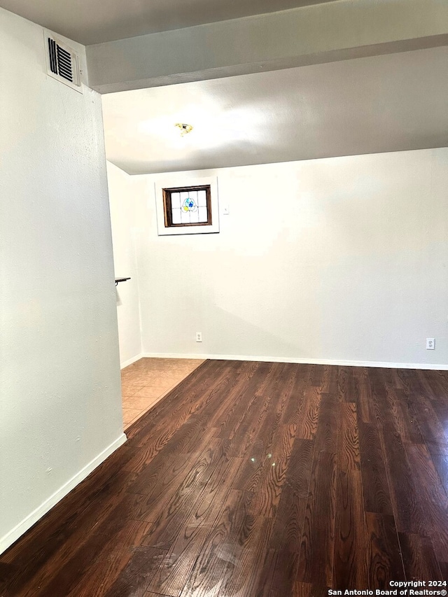 empty room featuring hardwood / wood-style flooring