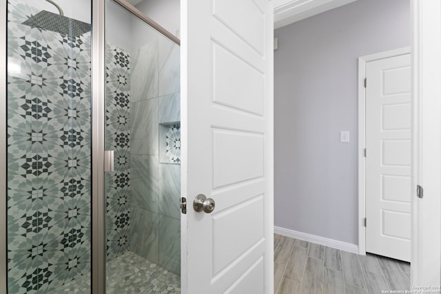 bathroom with an enclosed shower