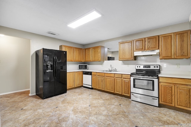 kitchen with appliances with stainless steel finishes and sink