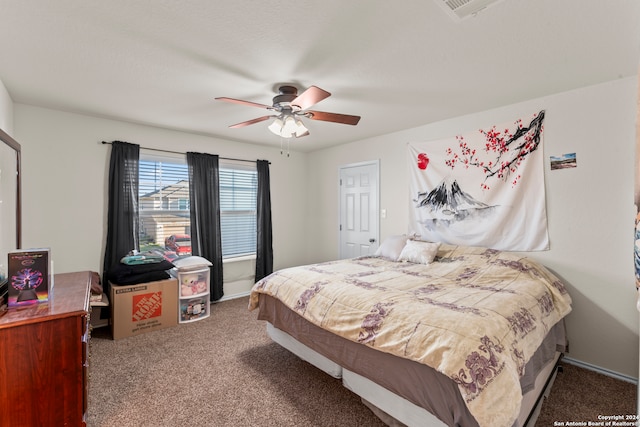 carpeted bedroom with ceiling fan