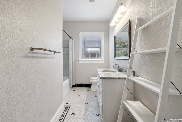 full bathroom featuring vanity, shower / tub combo, toilet, and tile patterned floors