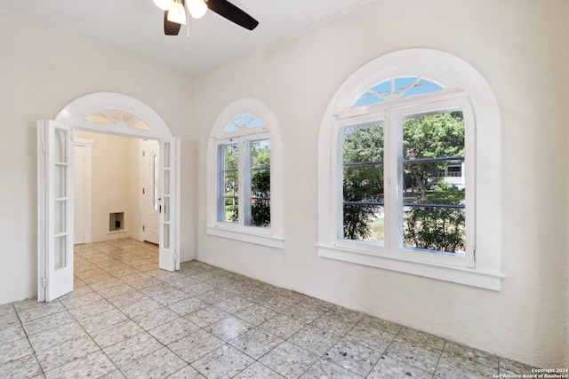 empty room featuring ceiling fan