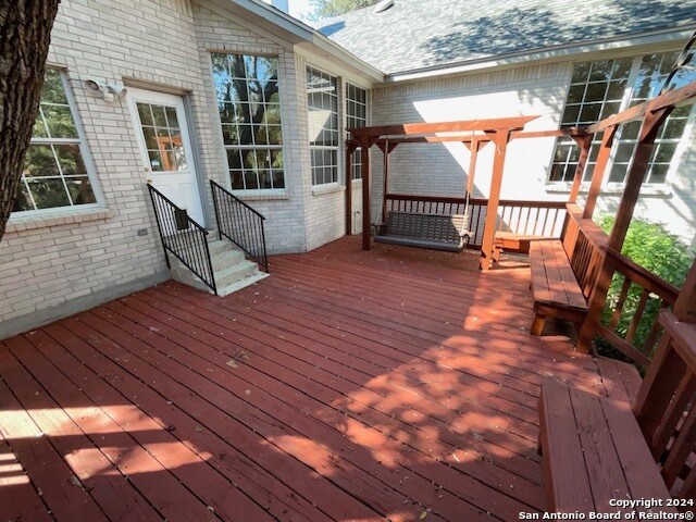 deck featuring a pergola