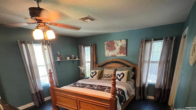 bedroom featuring ceiling fan