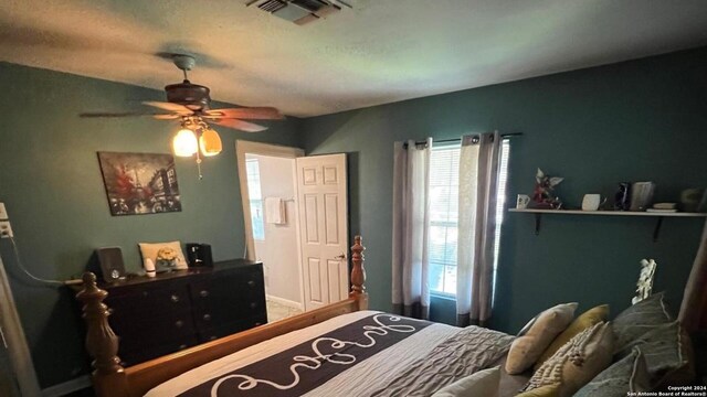 bedroom featuring ceiling fan