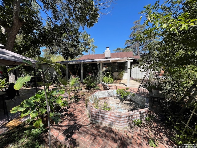 rear view of property with a patio