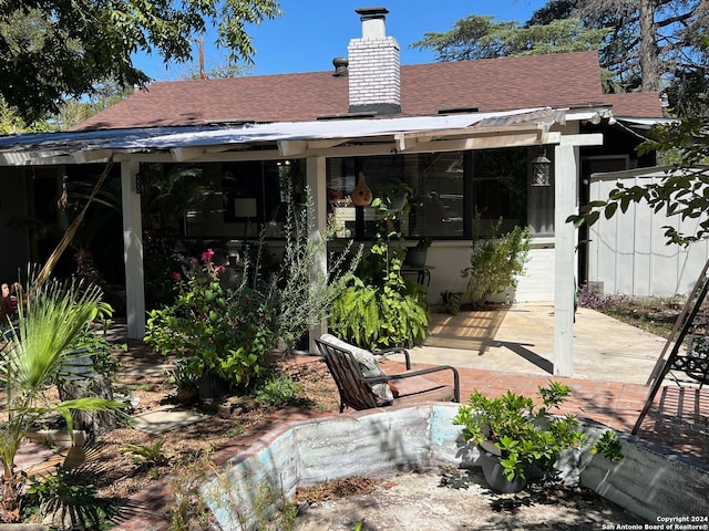 rear view of house featuring a patio area